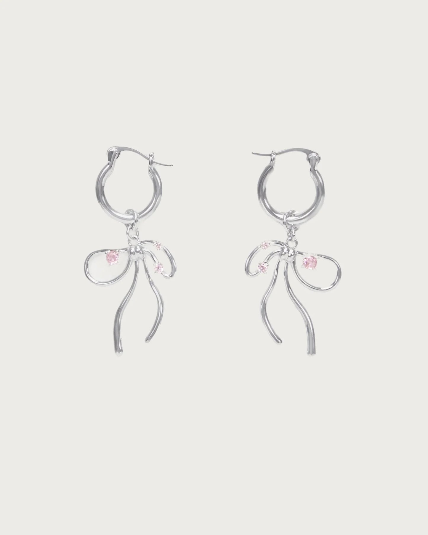 Plot Twist Earrings in Pink Silver