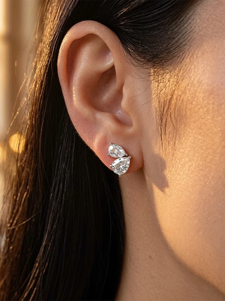 Lior stacked pear and round cut moissanite toi et moi studs in S925 sterling silver, alternate view 2